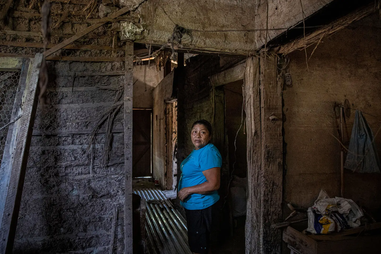 Members of the Ramirez family walk along train tracks in Coatzacoalcos in the Mexican state of Veracruz on March 23, 2021. 
          They fled their home in Santa Barbara, Honduras after their lives were threatened by gang members. Erica Ramirez is nine months pregnant. 
          Photo by Yael Martínez—Magnum for TIME