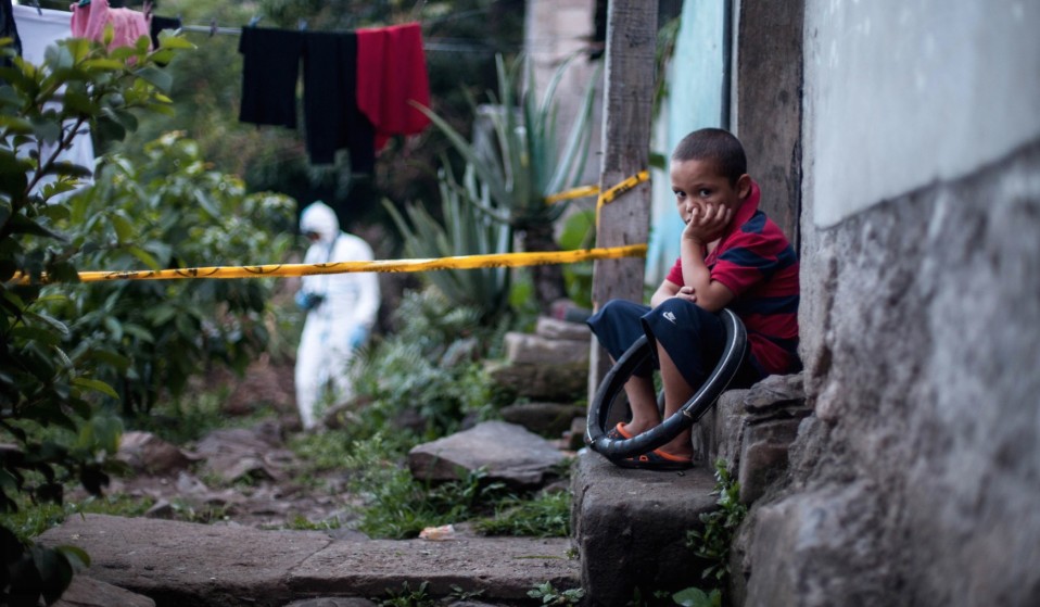 Members of the Ramirez family walk along train tracks in Coatzacoalcos in the Mexican state of Veracruz on March 23, 2021. 
          They fled their home in Santa Barbara, Honduras after their lives were threatened by gang members. Erica Ramirez is nine months pregnant. 
          Photo by Yael Martínez—Magnum for TIME